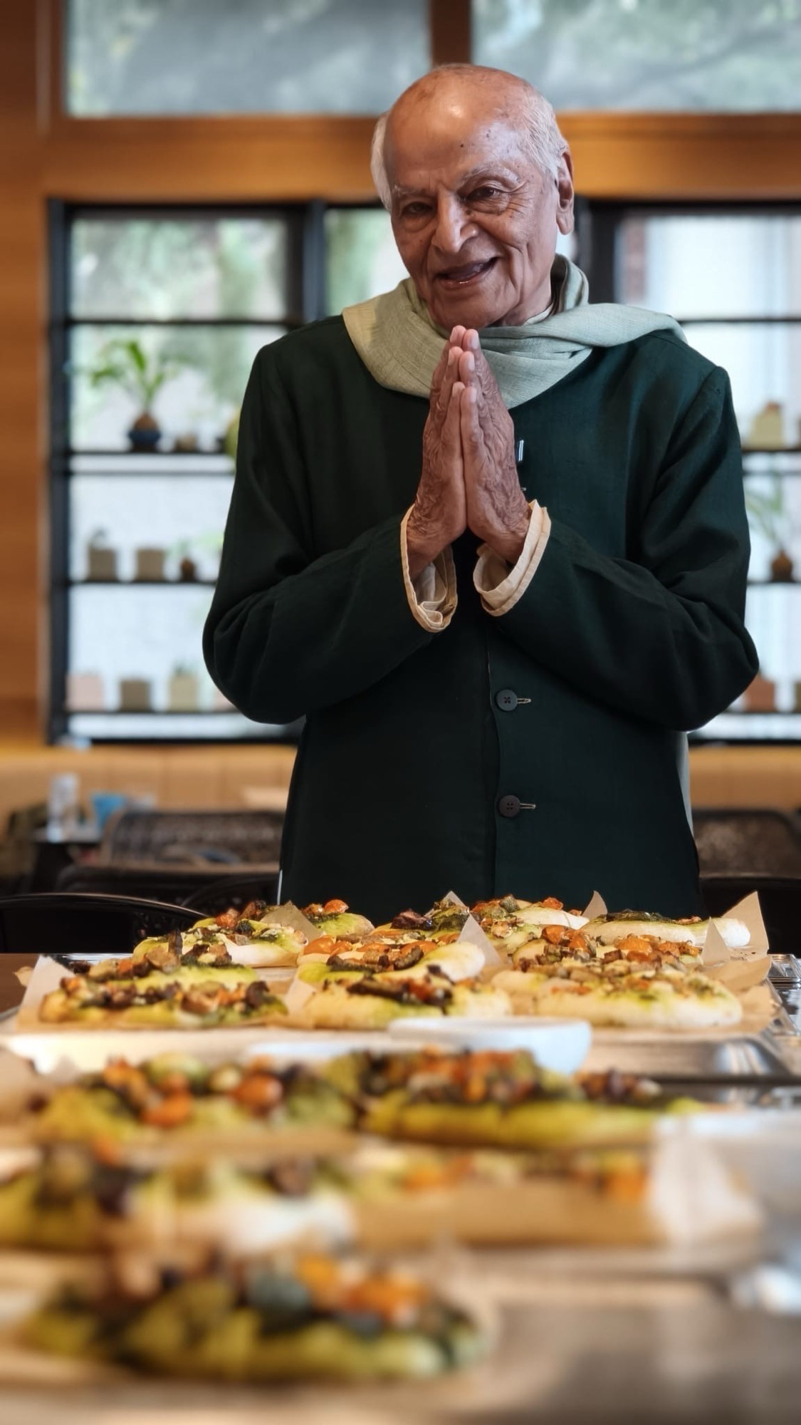Our teacher Satish Kumar led a grace prayer of gratitude before a meal at Food Hub.